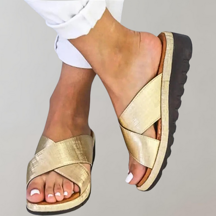 Moderigtige Dame Abelone slip-in damessandaler med elegant stil. Perfekte sommersko til hverdag.