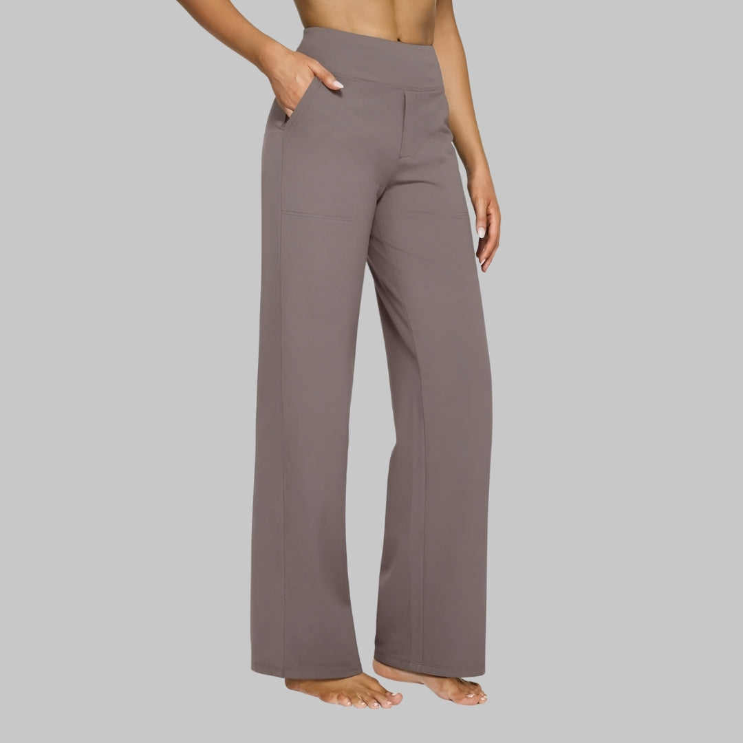 Krølfri sorte dame stretchbukser af polyester/elastan. Behagelige hverdagsbukser med elastik i taljen.