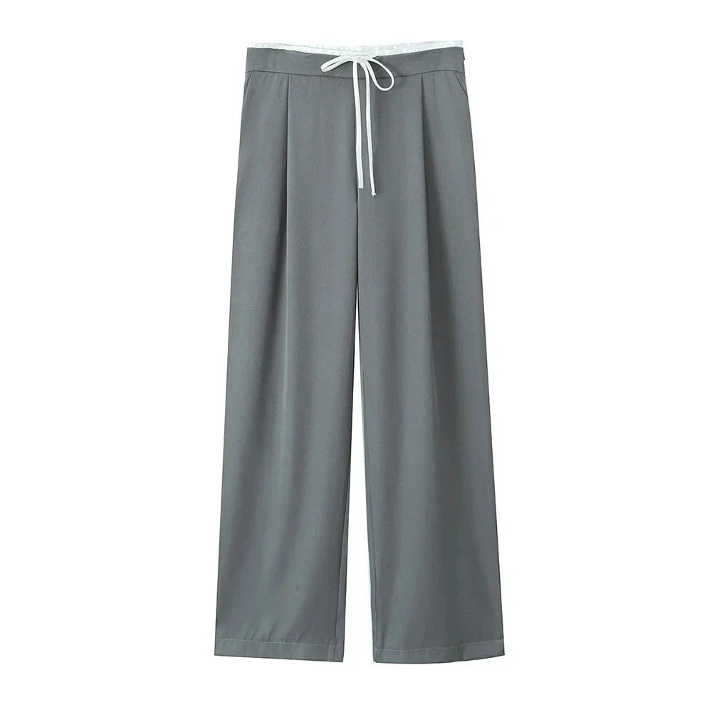 Brede ben damebukser med elastisk talje. Løs pasform for maksimal hverdagskomfort. Moderne polyester.