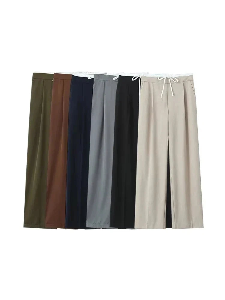 Moderne brede ben bukser til damer. Hverdagskomfort med løs pasform, elastisk talje og åndbar polyester.