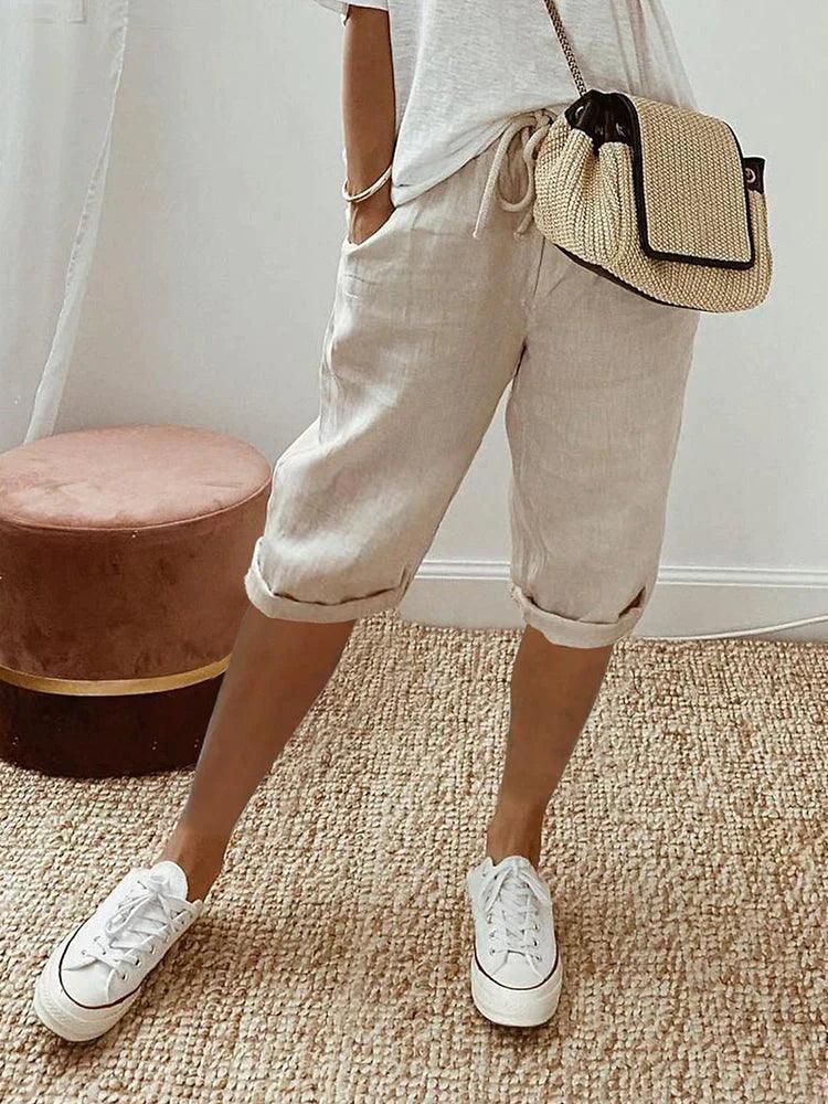 Stilfulde Capri-bukser 'Margit' til damer med smarte oprullede ben, ideelle for et casual, afslappet look.