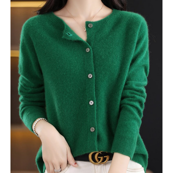 Farverig dame cardigan med rund hals, tilføjer et pift til ethvert outfit. Komfortabel og elegant hverdagsbrug.