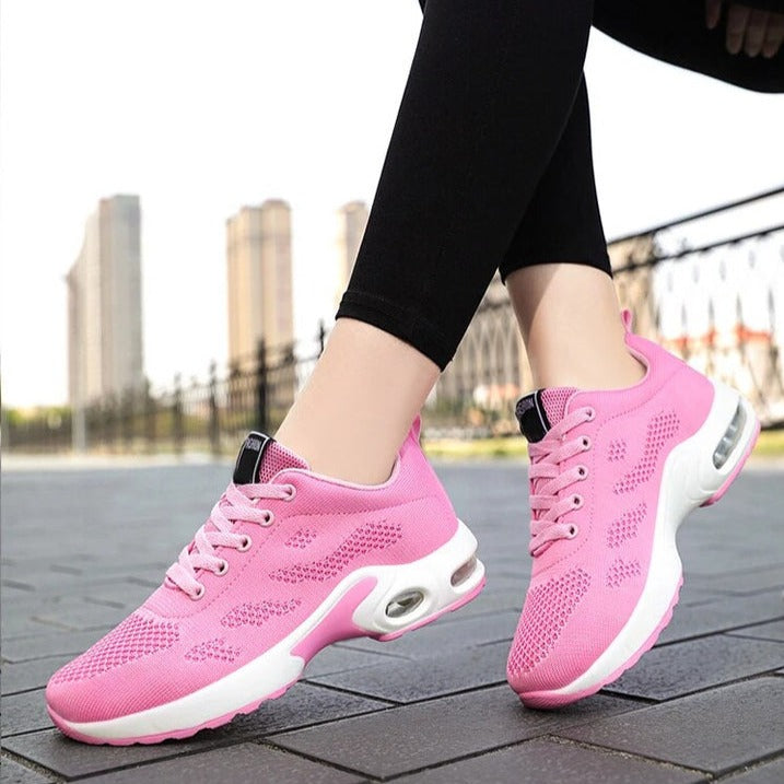 Sporty dame sneakers med avanceret svangstøtte, ideelle til både fitness og hverdagsaktiviteter.