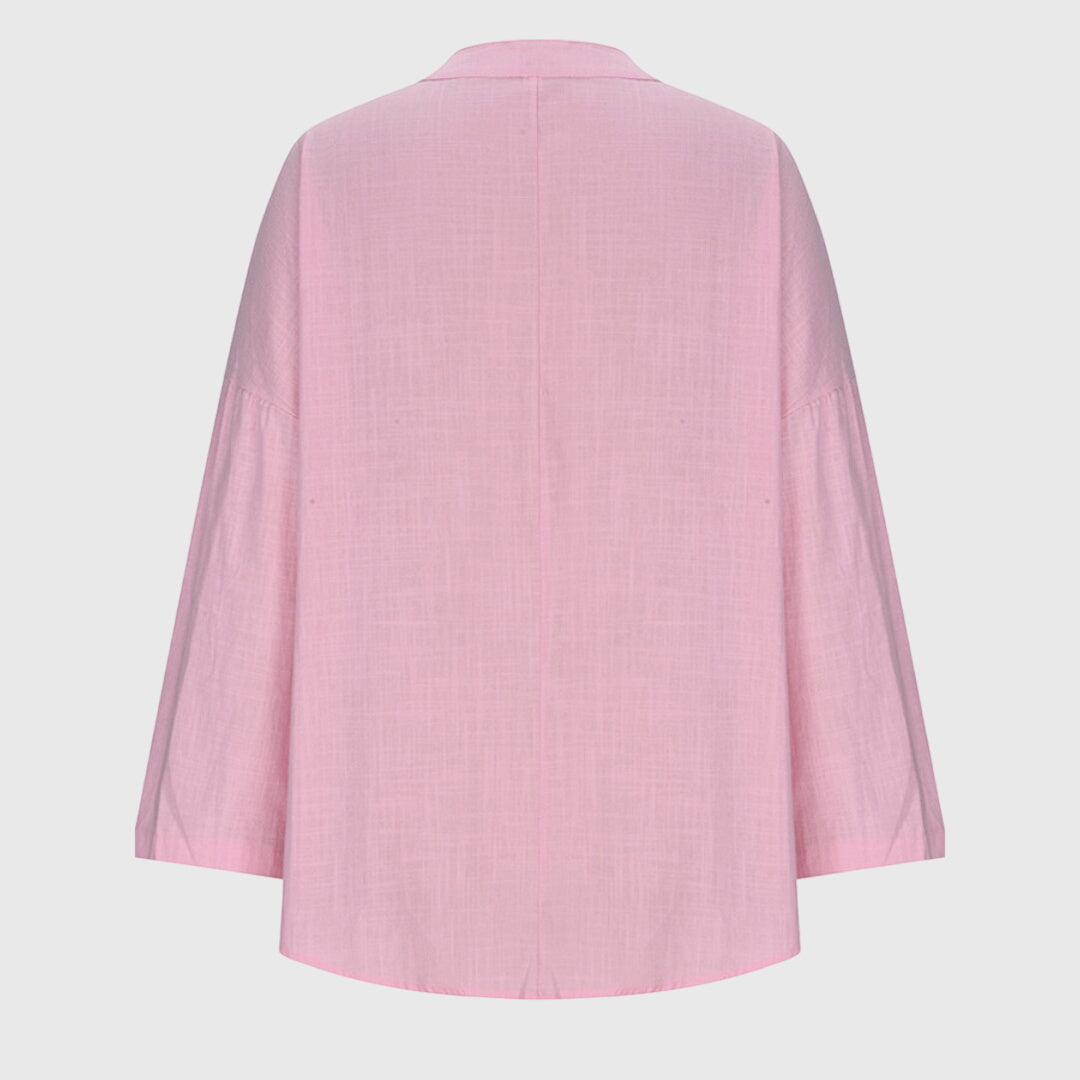 Dame top med løs pasform, lange ærmer; en stilfuld og alsidig tilføjelse til din garderobe.