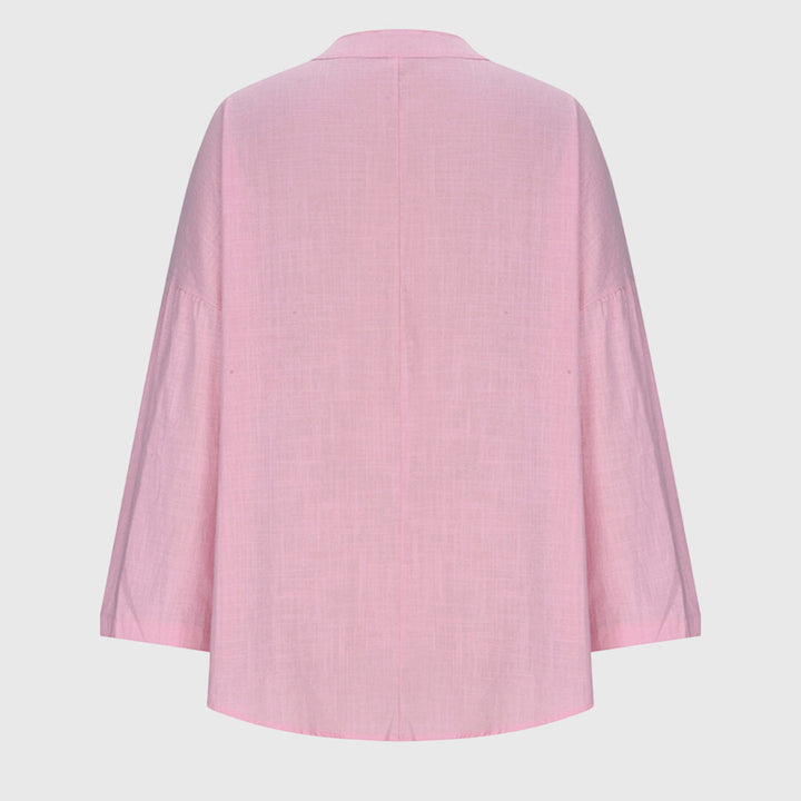 Dame top med løs pasform, lange ærmer; en stilfuld og alsidig tilføjelse til din garderobe.