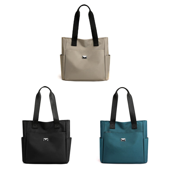 Stilfuld og robust dame letvægts vandtæt taske. Crossbody model i holdbart nylon til alle vejr.