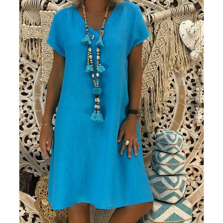 Komfortabel tunika-midi-kjole til damer. V-hals og kortærmet design, en perfekt afslappet sommerkjole.