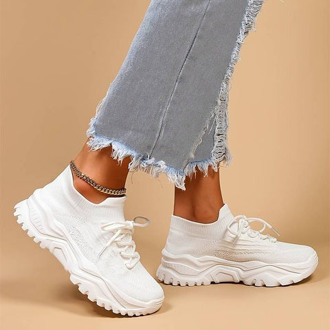 Ortopædiske damesneakers med åndbart design og god fodstøtte, ideelle for optimal komfort.