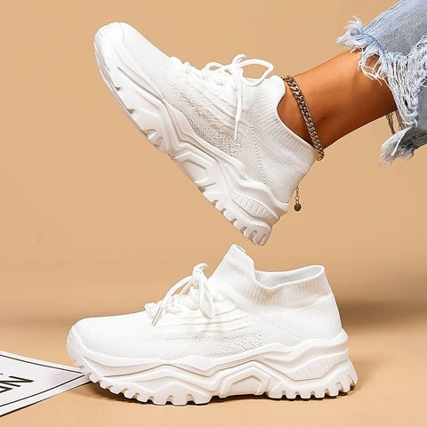 Hvide dame sneakers med åndbar overdel og ergonomisk fodstøtte for ultimativ komfort.