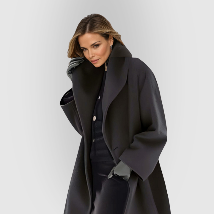 Klassisk damefrakke, oversized model m. høj krave – tidløs elegance & varme til kolde dage.