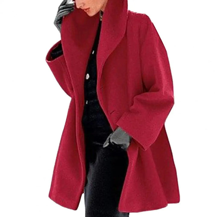 Tidløs elegant oversized frakke til kvinder, med markant høj krave & moderne look.