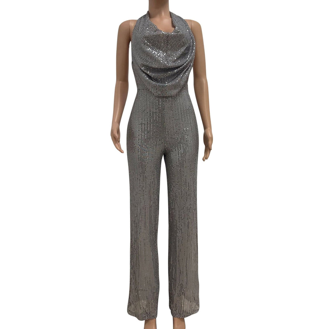 Chic dame jumpsuit med pailletter og en smuk draperet halterneck. Ideelt festtøj med et glamorøst look.