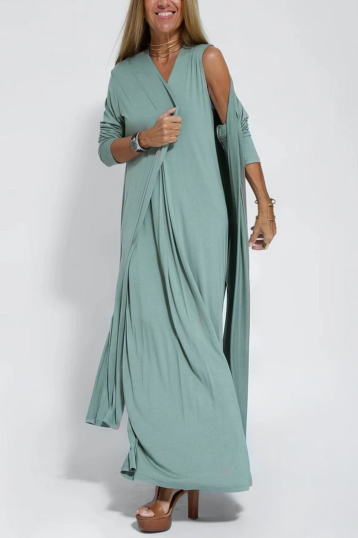 Lang elegant plus size kjole til damer, ærmeløs med flot V-udskæring.