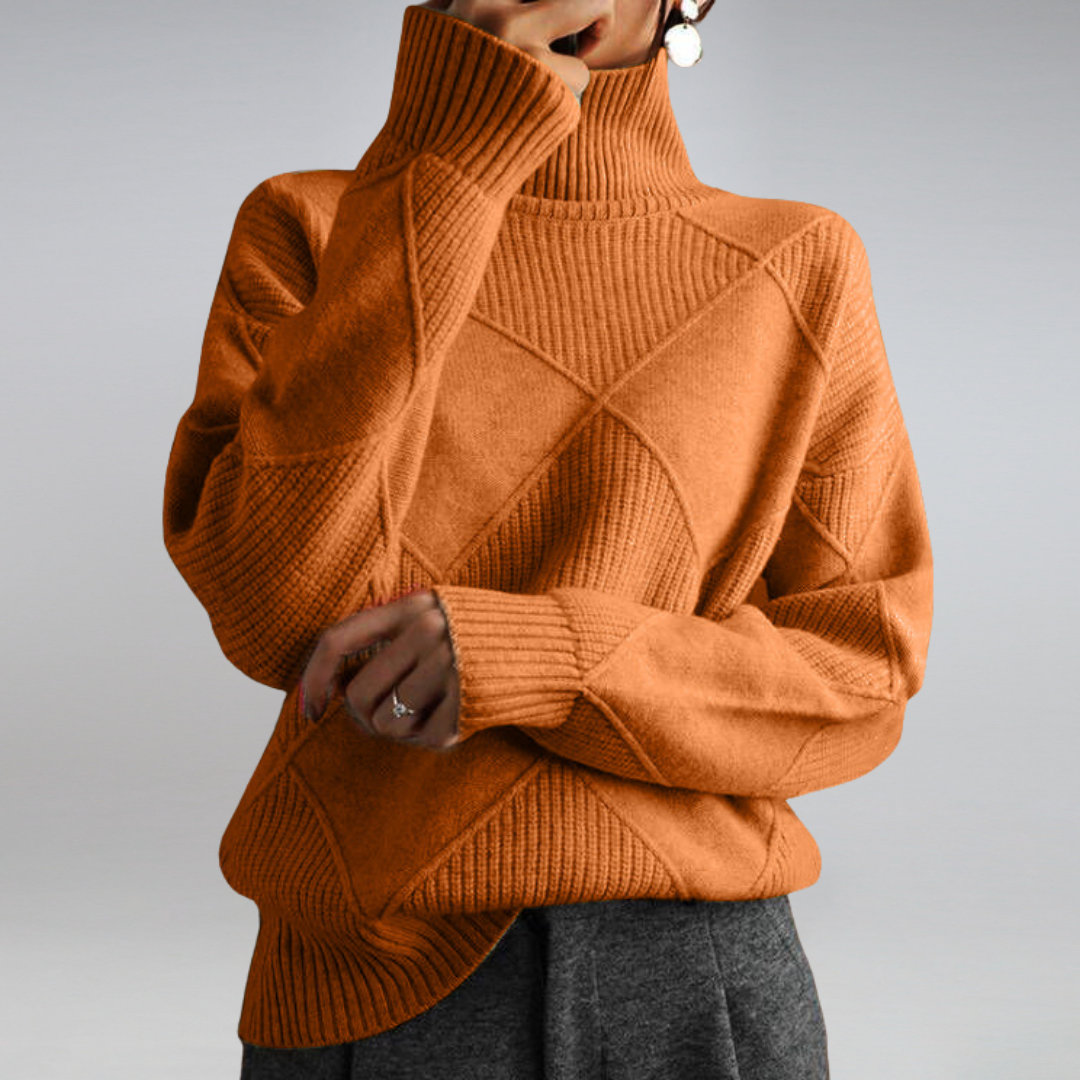 Dame rullekrave sweater i blød, varm strik. Essentiel til efterårs- og vintergarderoben.