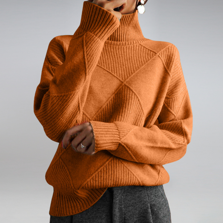 Dame rullekrave sweater i blød, varm strik. Essentiel til efterårs- og vintergarderoben.