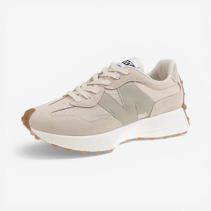 Blå, letvægts damesneakers. Elegant design, spids snude, justerbar pasform og skridsikker ydersål.