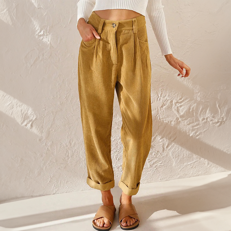 Alsidige højtaljede damebukser i løs pasform. Ideelle til både arbejde og hverdag for et moderne look.