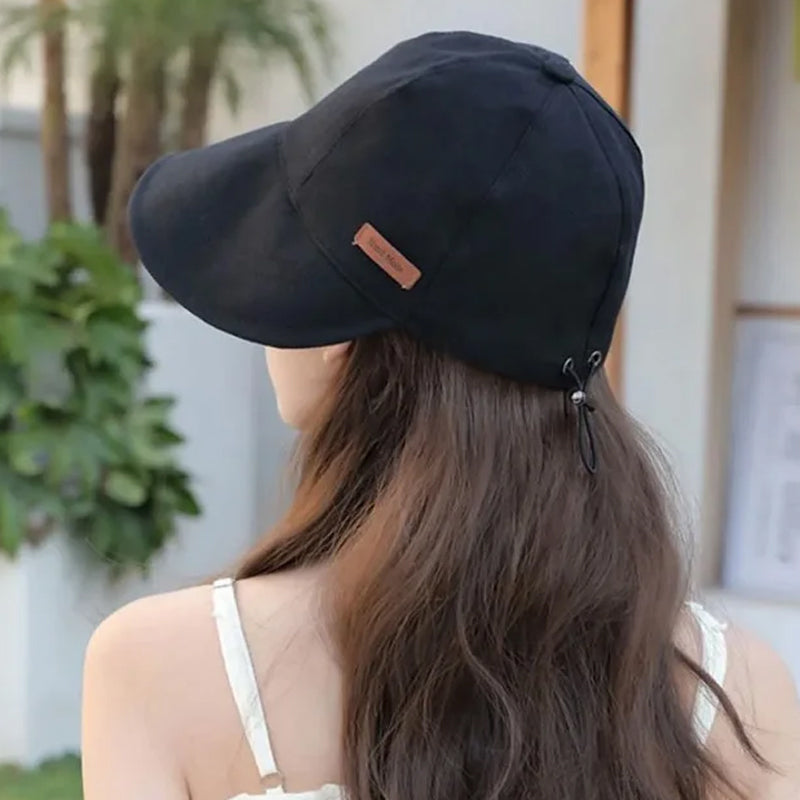 Kvinders UV-beskyttelseshat med bred skygge, foldbar, i sort, beige, khaki eller blå til udendørs aktiviteter.