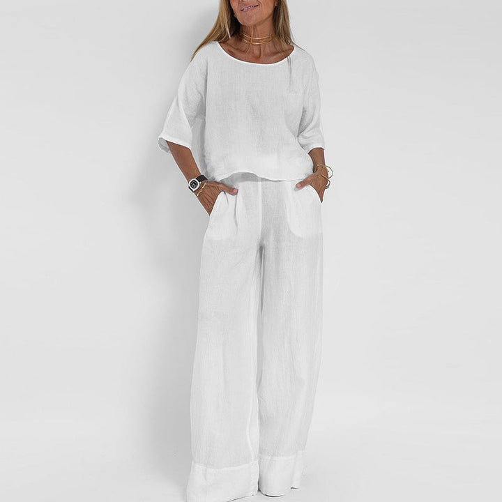 Trendy mode sæt til kvinder: Afslappet top og vide bukser, perfekt for fritid og sommer komfort.