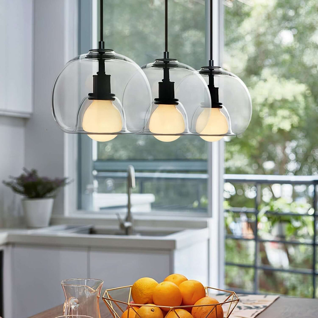 Moderne pendellampe i metal og glas