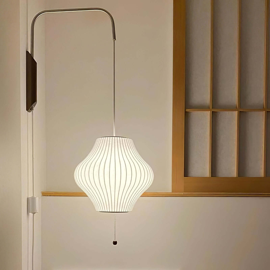Moderne væglampe med kugledesign og varmt hvidt lys