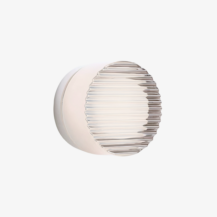 Stilfuld væglampe med rundt design. Dekorativ belysning, der komplementerer enhver indretning.