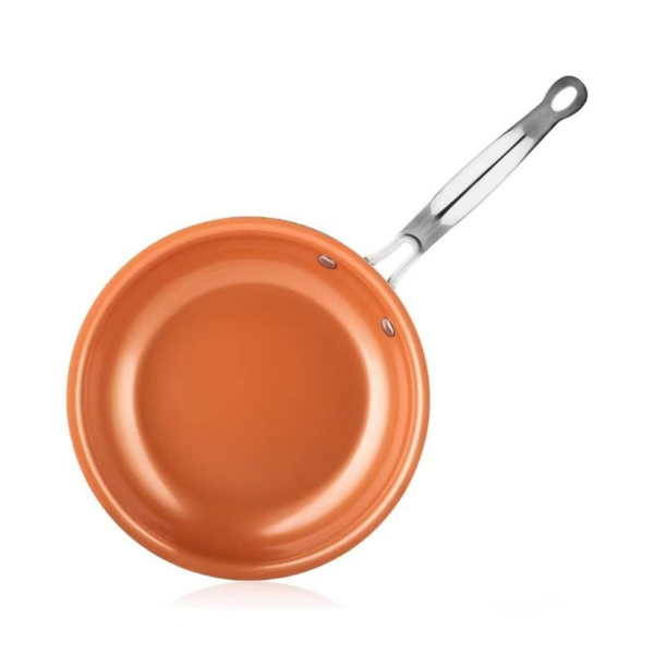 Alsidig kobberpande til induktion. Ovnfast design med non-stick belægning for varieret, præcis madlavning.