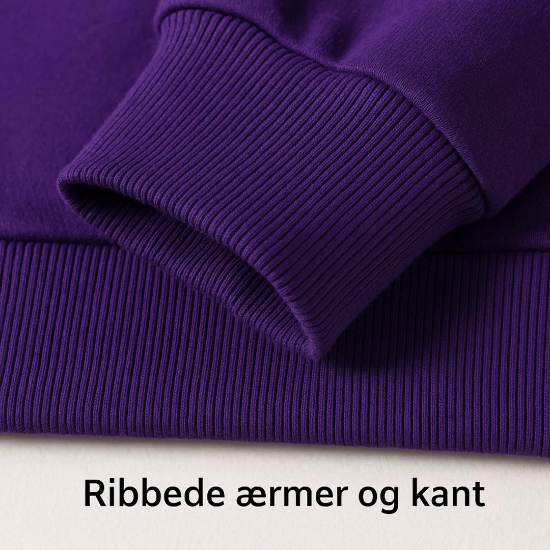 Blød kvinders hjertesweater strækkes let, viser dens komfortable og fleksible kvalitet.