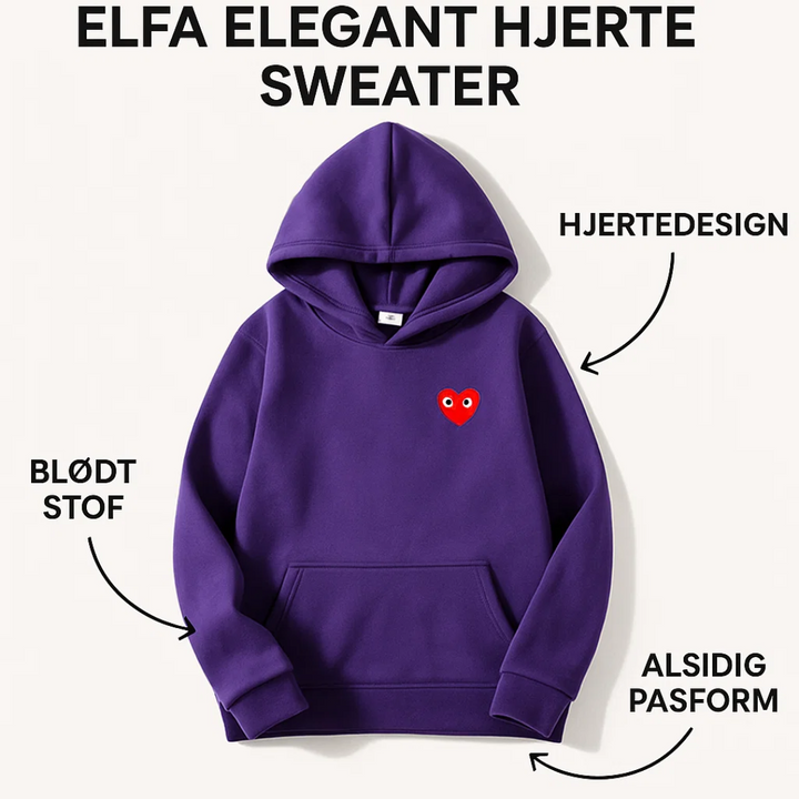 Kvinde iført hjertesweater med en taske, fremhæver casual elegance og komfortabel stil.
