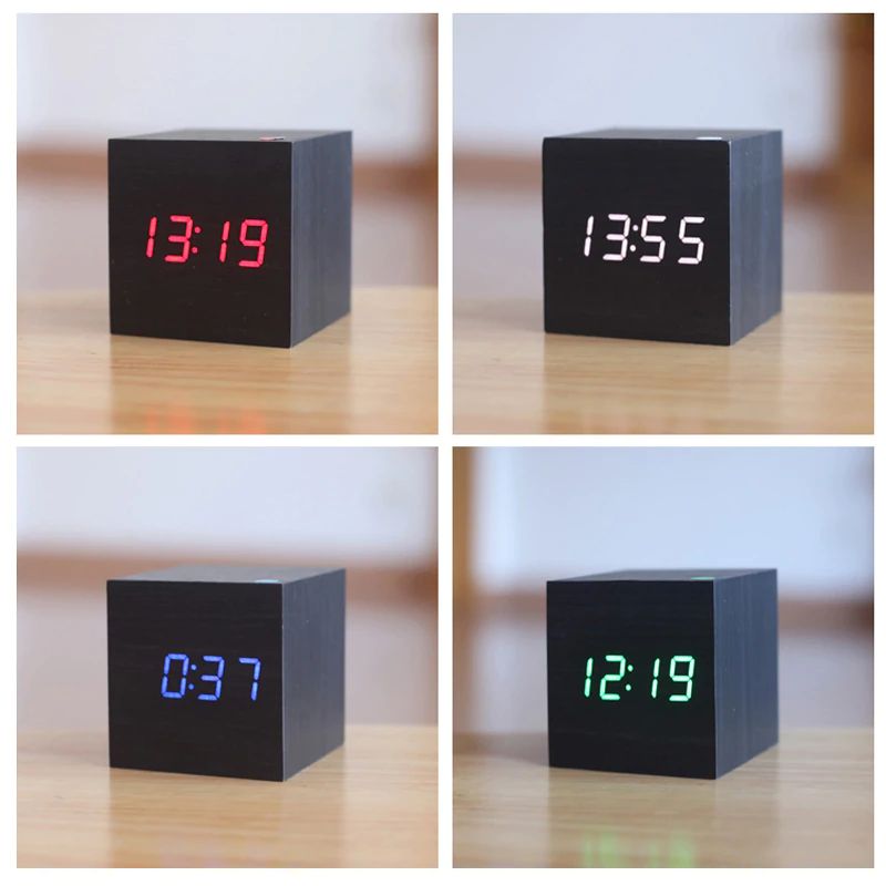 Digital bordur i moderne, minimalistisk terningdesign af træ, ideel til skrivebord eller hylde, med kompakt størrelse.