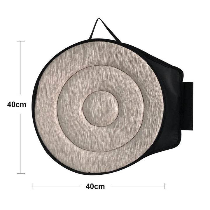 Nærbillede af ergonomisk drejbart sædepude i memory skum, designet for 360° rotation og langvarig komfort.