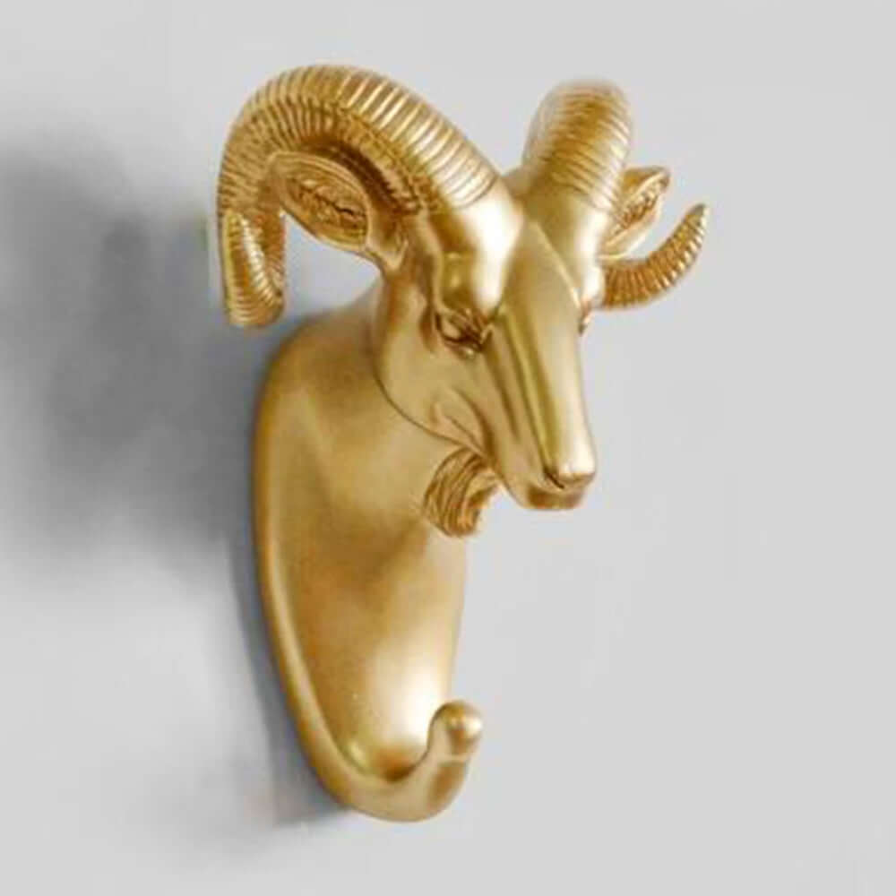 Dekorative dyre vægkroge i guld