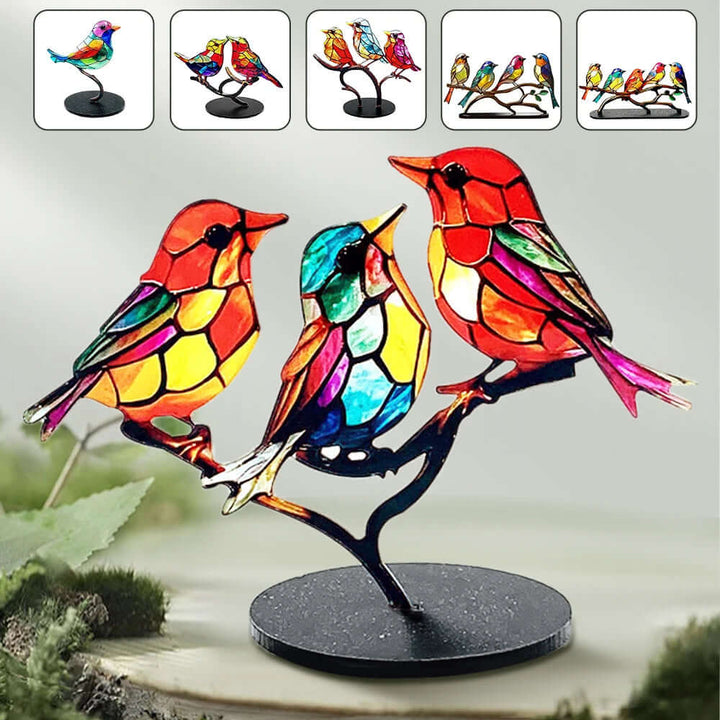 Dekorative fuglefigurer i farvet glas