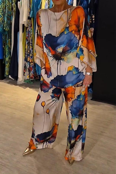Trendy dame co-ord sæt med vintage blomsterprint. Komfortabelt og elegant 2-delt buksesæt til sommergarderoben.