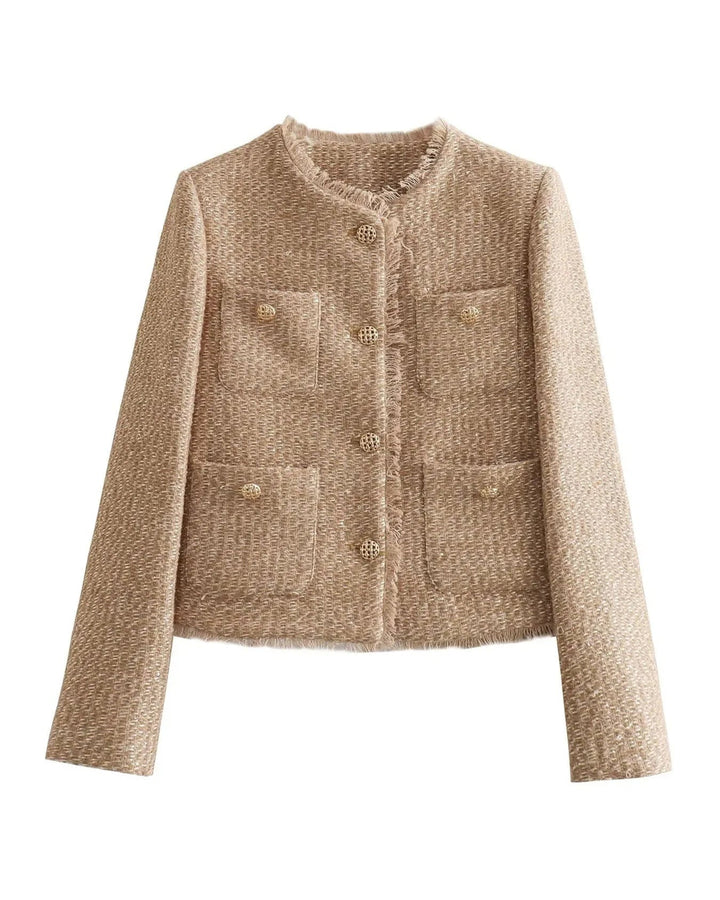Dansk design beige vinterfrakke til damer. Elegant overtøj med fokus på komfort og vindhæmmende kvalitet.