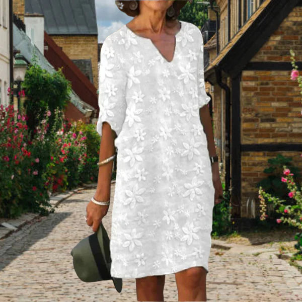 Elegant blomstret midi sommerkjole til kvinder med stilfuld V-hals, perfekt til både hverdag og fest.