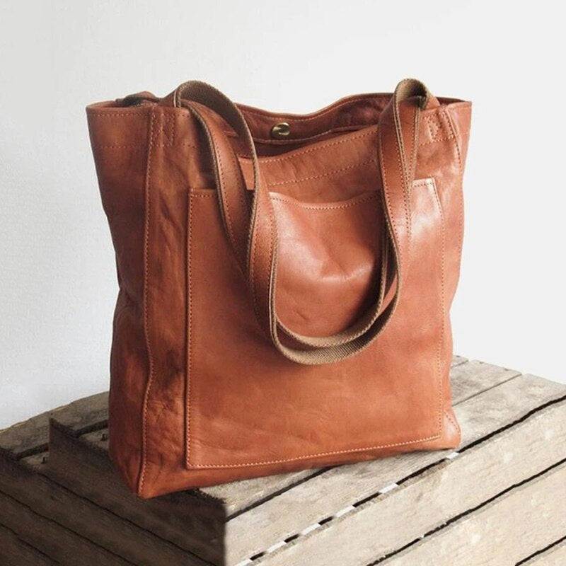 Elegant brun kvinde håndtaske, tidløst design og holdbar kvalitet til hverdagsbrug.