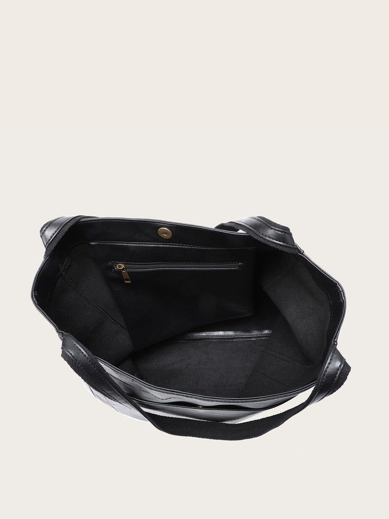 Elegant kvinde taske i klassisk design, en essentiel accessory for den stilbevidste.