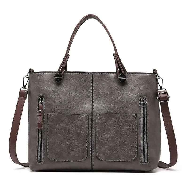 Stilfuld sort crossbody taske til damer. Perfekt hverdagstaske, der kombinerer elegance og funktionalitet.