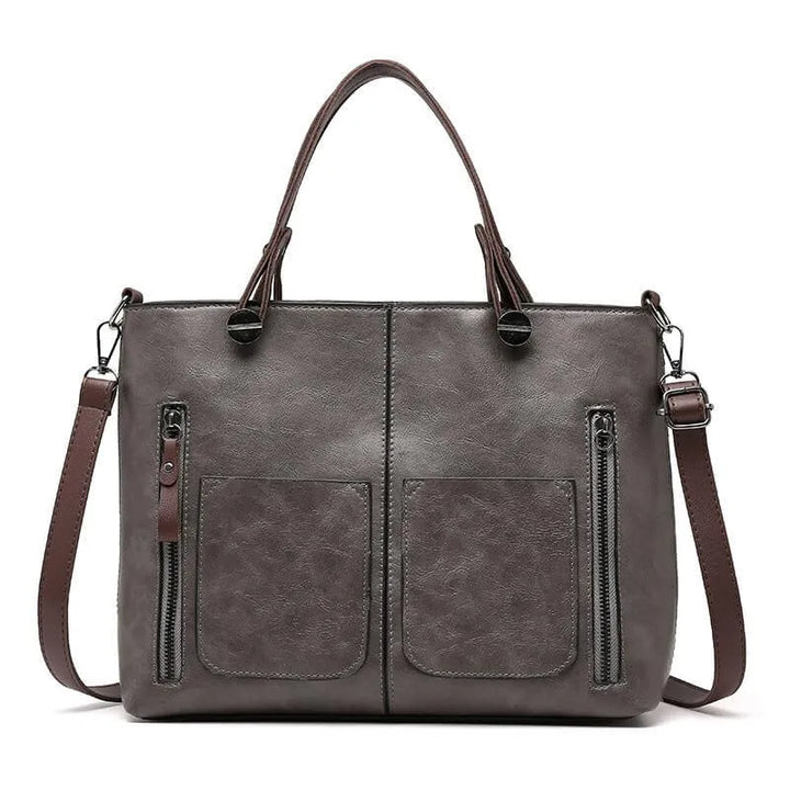 Stilfuld sort crossbody taske til damer. Perfekt hverdagstaske, der kombinerer elegance og funktionalitet.