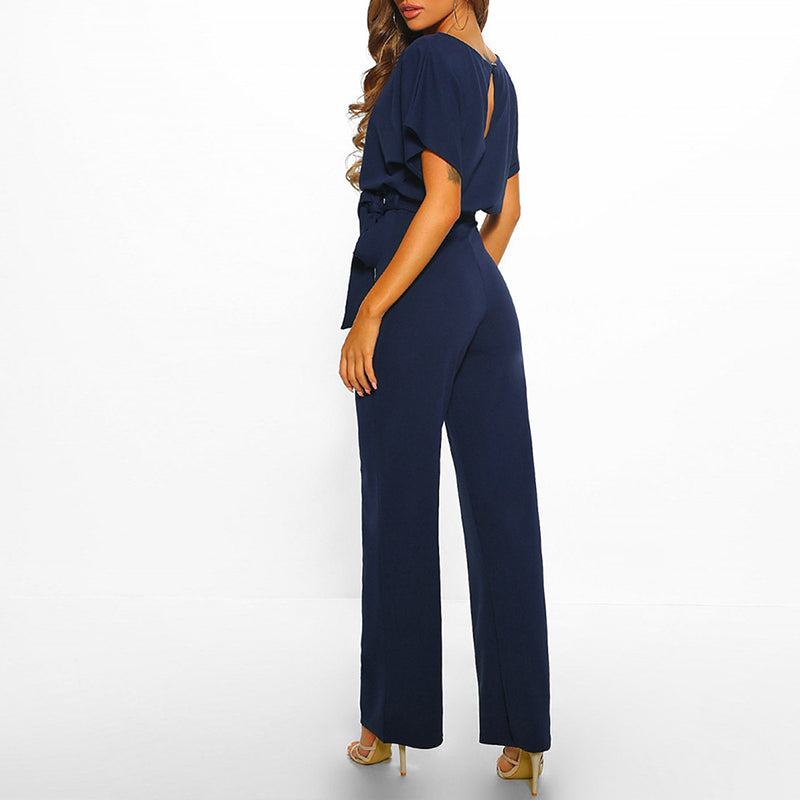 Elegant Clarissa dame jumpsuit med bælte. Perfekt til fest, kontor og stilfuld hverdag.