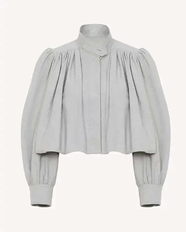 Katrine elegant cropped bomberjakke til kvinder med puffærmer. Moderigtig damejakke for et sofistikeret udtryk.