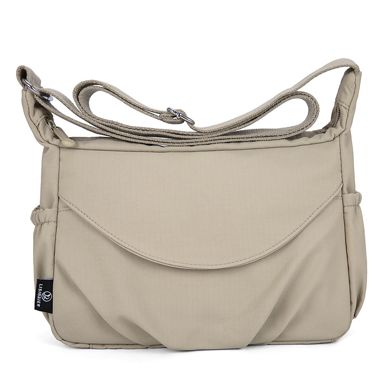 Robust sort crossbody dametaske, vandafvisende oxfordstof til alle vejrforhold.