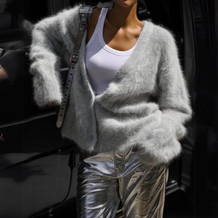 Elegant lyserød cardigan til kvinder; et strejf af farve og luksus til din garderobe.