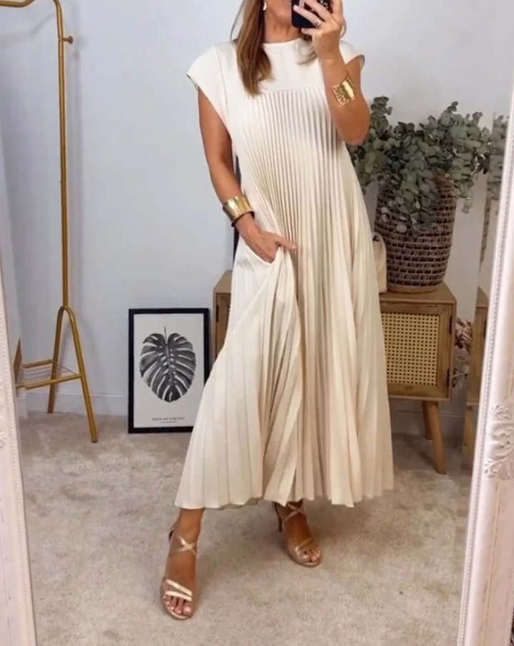 Elegant dame festkjole med V-udskæring til bryllupper og særlige anledninger. Stilfuld midi cocktailkjole.