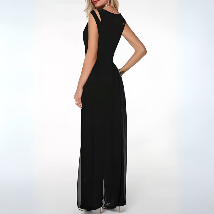 Stilfuld blå dame jumpsuit med V-udskæring. Komfortabel og elegant heldragt til kvinder, ideel til fest.