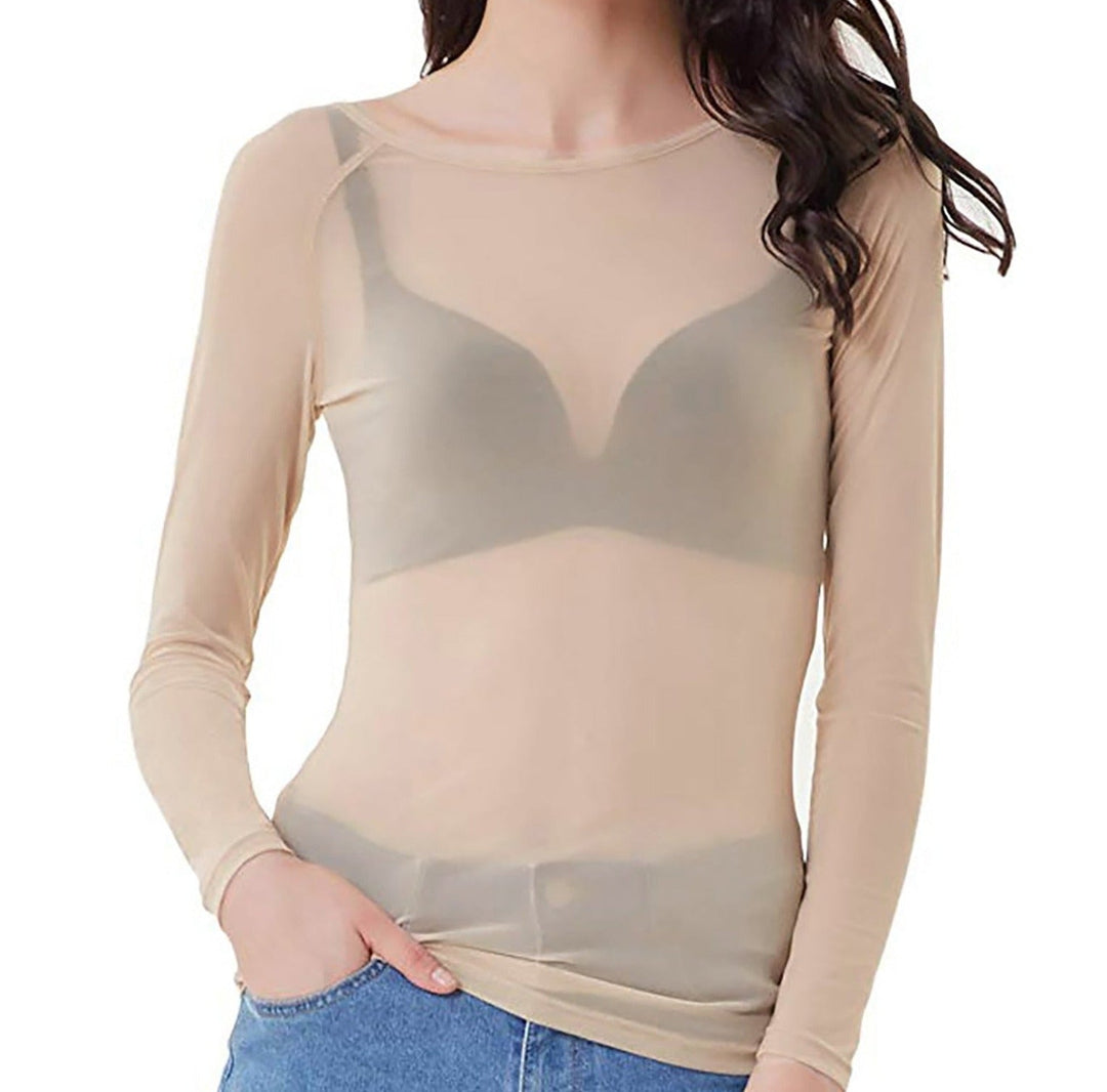 Trendy creme langærmet dametop med moderne pasform og elegant let gennemsigtighed for et stilfuldt look.