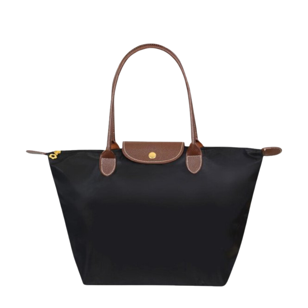 Elegant dame skuldertaske i sort med justerbar rem og unikt schedel design.