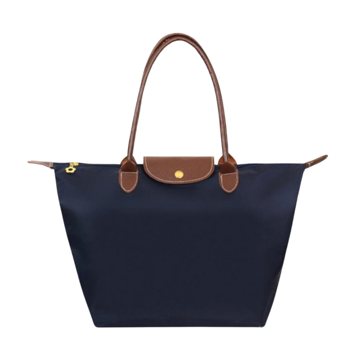 Grøn elegant dametaske med schedel mønster, justerbar crossbody rem og plads til det essentielle.
