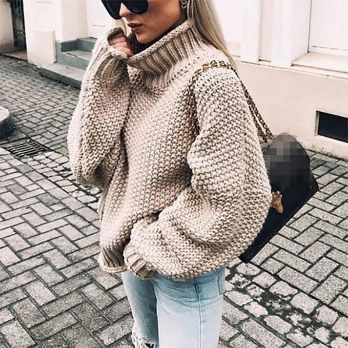 Elegant dame sweater med halvhøj krave i blød strik. Komfortabel og stilfuld til hverdagsbrug.